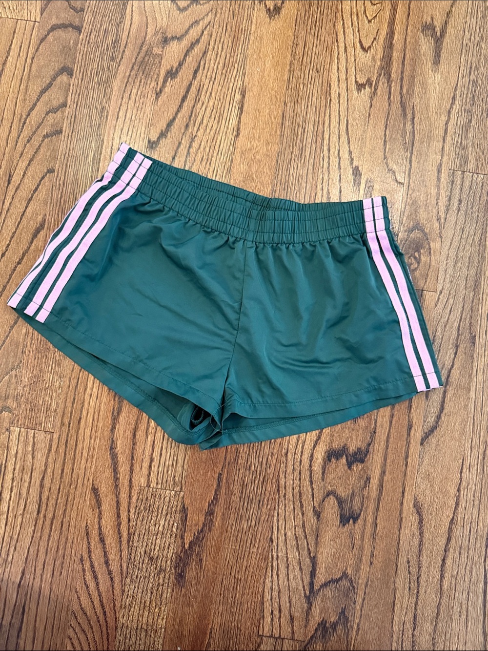 Edikted Dark Green Athletic Shorts with Pink Side Stripes